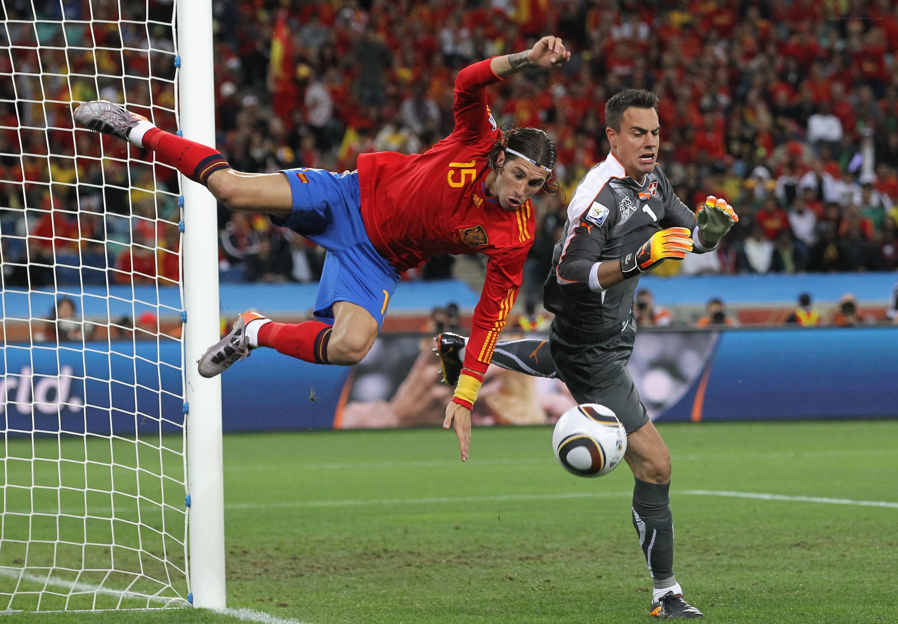Soccer player scoring goal