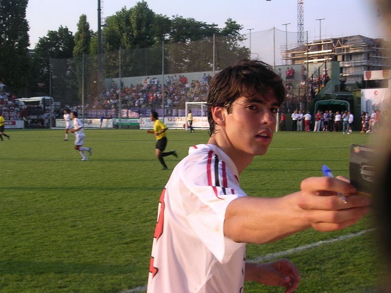 Soccer player signing autograph