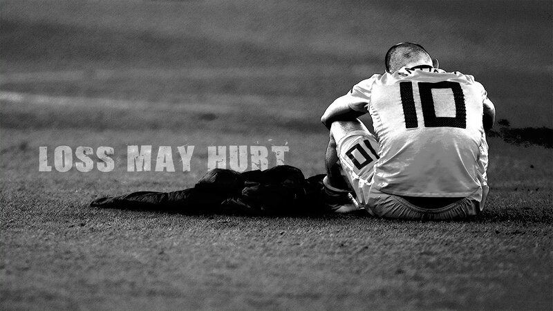 Soccer Player Sitting on Field — Black