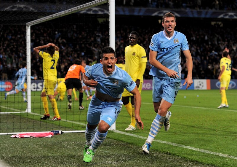 Soccer players celebrating a goal