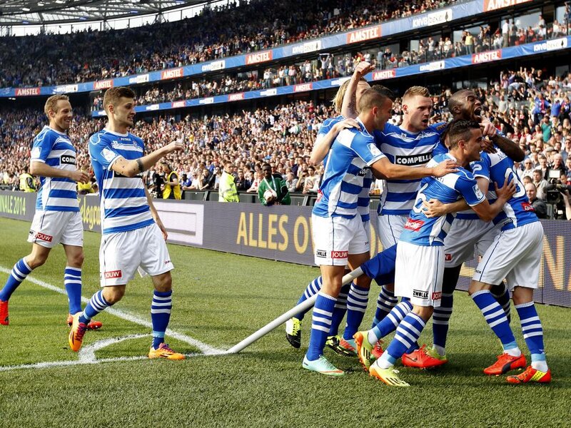 Soccer Players Celebrating — Blue, Celebratory, Afternoon, Photograph