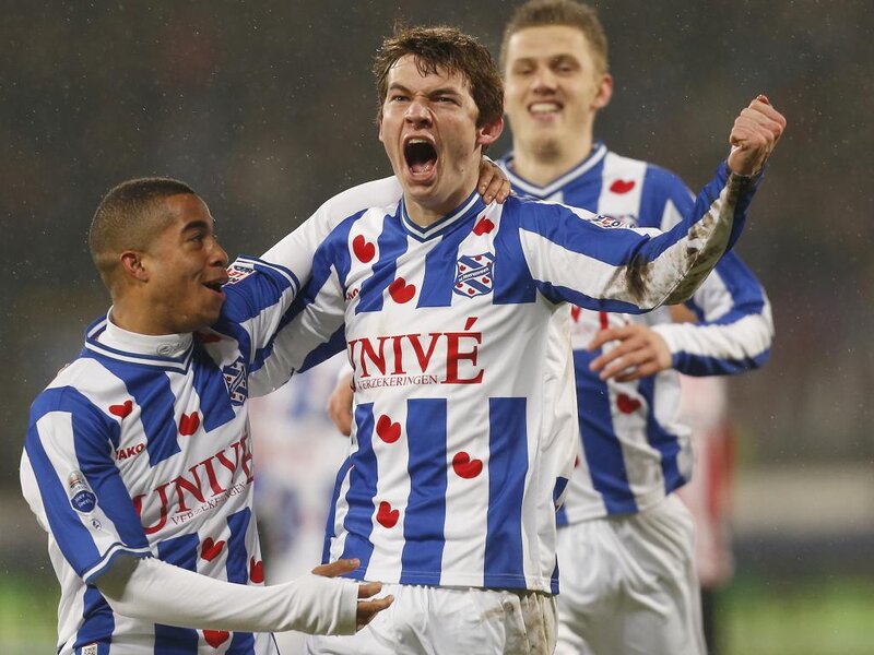 Soccer Players Celebrating — Blue, Celebratory, Night