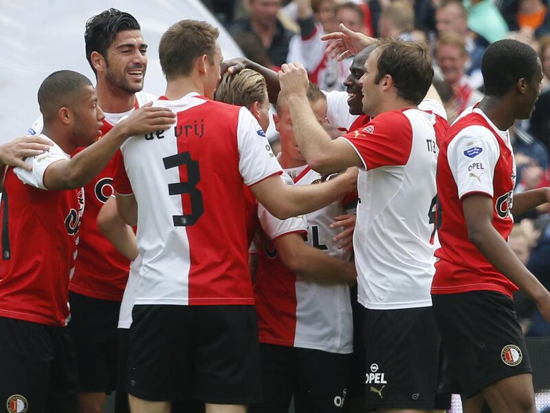 Soccer Players Celebrating — Red, Celebratory, Afternoon, Photograph, Crowd