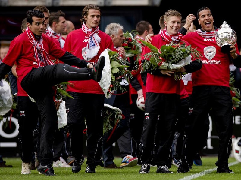 Soccer Players Celebrating — Red, Celebratory, Afternoon