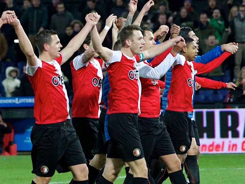 Soccer Players Celebrating — Red, Celebratory, Night, Photograph, Crowd, Stadium