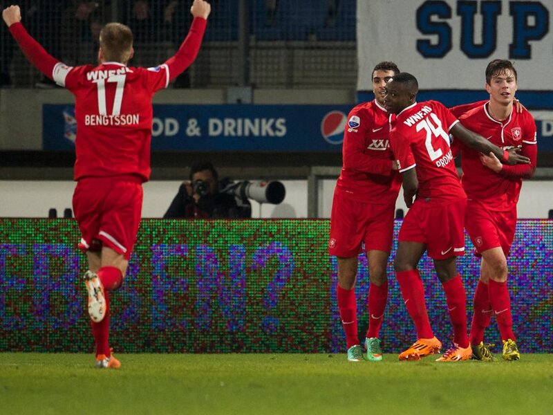 Soccer Players Celebrating — Red, Celebratory, Night, Photograph, Field