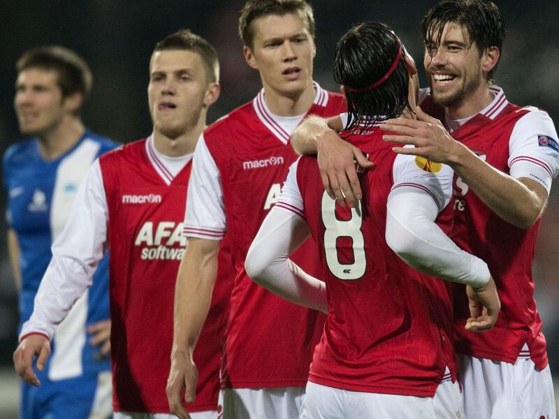 Soccer Players Celebrating — Red, Celebratory, Night, Photograph, Jerseys
