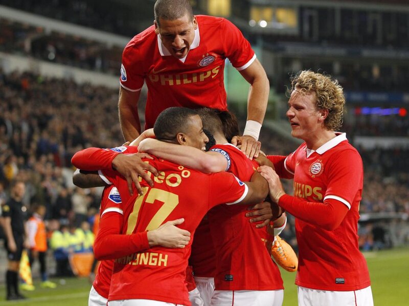 Soccer Players Celebrating — Red, Celebratory, Night, Photograph, Stadium