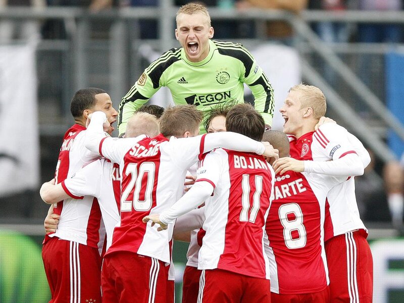 Soccer Players Celebrating — Red, Celebratory, Photograph, Goalkeeper