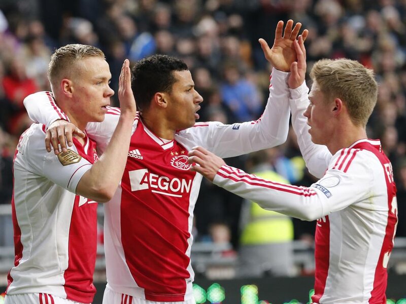 Soccer Players Celebrating — Red, Celebratory, Photograph