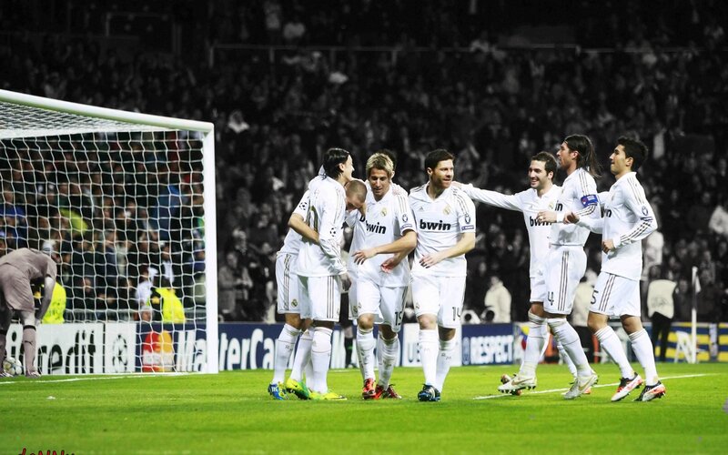 Soccer Players Celebrating — White, Celebratory, Night, Photograph, Goal Net