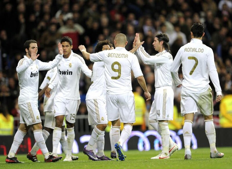 Soccer Players Celebrating — White, Celebratory, Night, Photograph, Stadium, Crowd, Jerseys