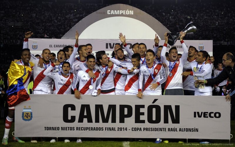 Soccer Players Celebrating — White, Celebratory, Night, Photograph, Trophy