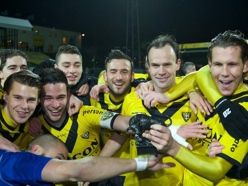 Soccer Players Celebrating — Yellow, Celebratory, Night