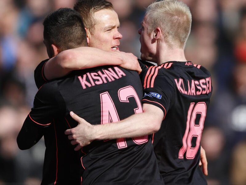 Soccer Players Hugging — Black, Celebratory, Afternoon