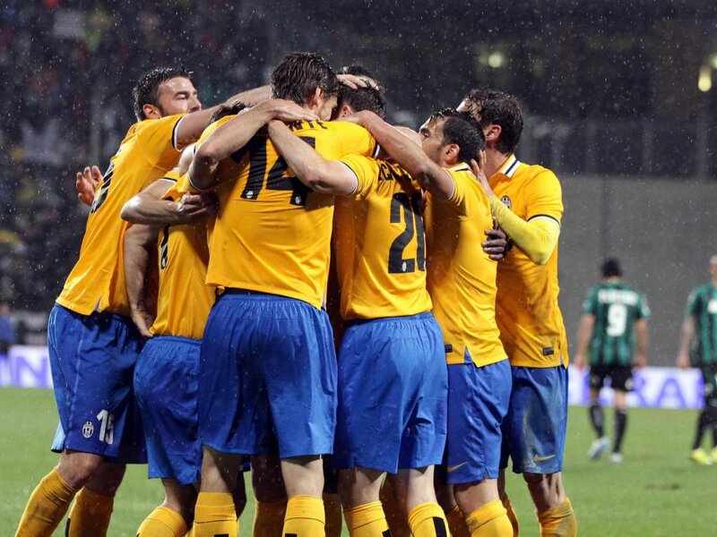 Soccer Players Hugging — Yellow