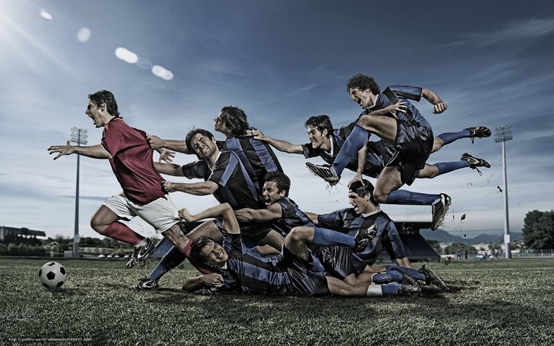 Soccer Players in Action — Blue, Dramatic, Afternoon, Photograph