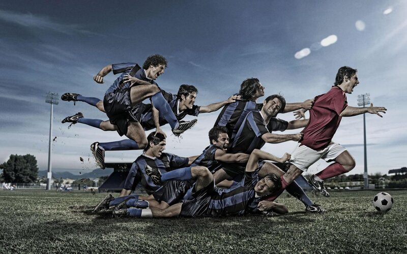Soccer Players in Action — Blue, Dynamic, Afternoon