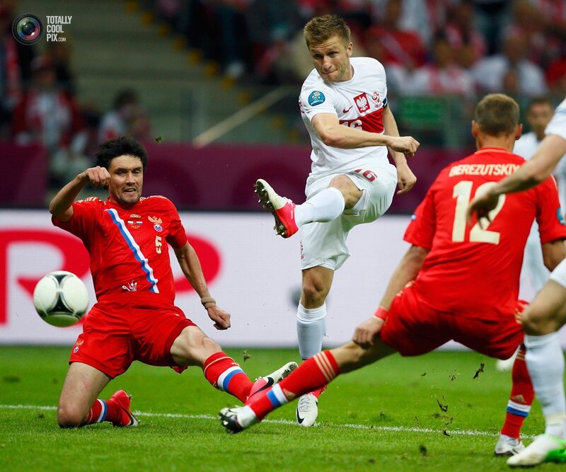 Soccer players in action during match