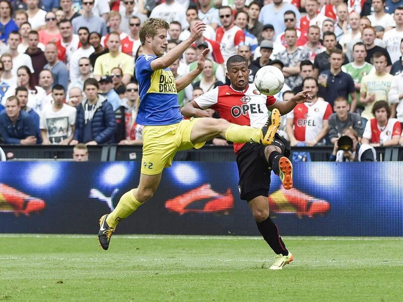 Soccer Players in Action — Green, Dynamic, Afternoon, Photograph, Crowd