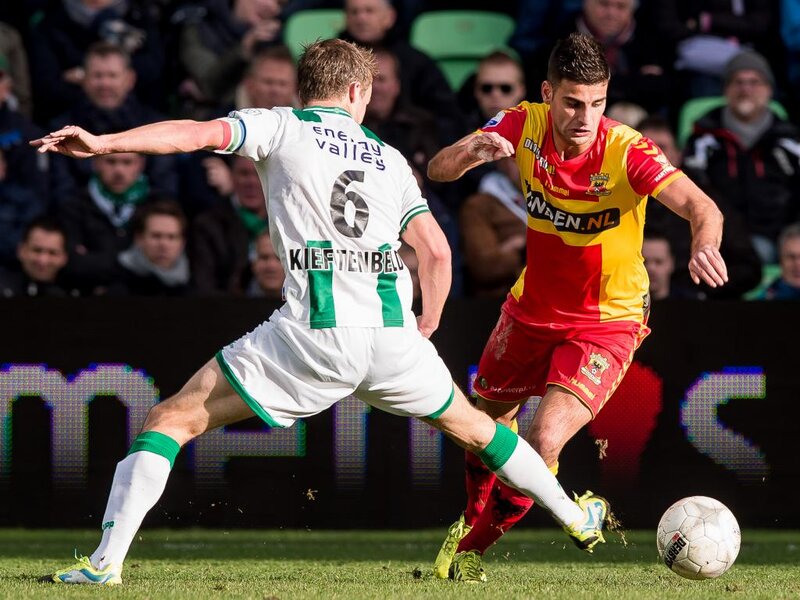 Soccer Players in Action — Green, Intense, Afternoon, Photograph