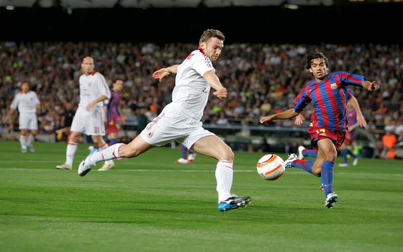 Soccer players in action on field