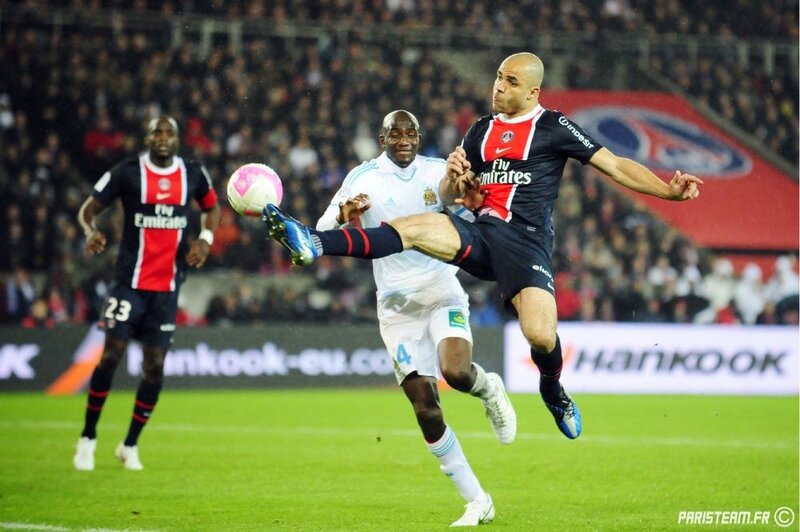 Soccer players in action on field