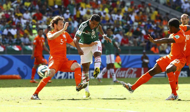 Soccer Players in Action — Orange, Dynamic