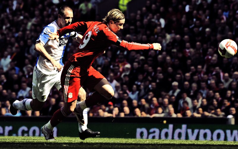 Soccer Players in Action — Red, Dynamic, Afternoon