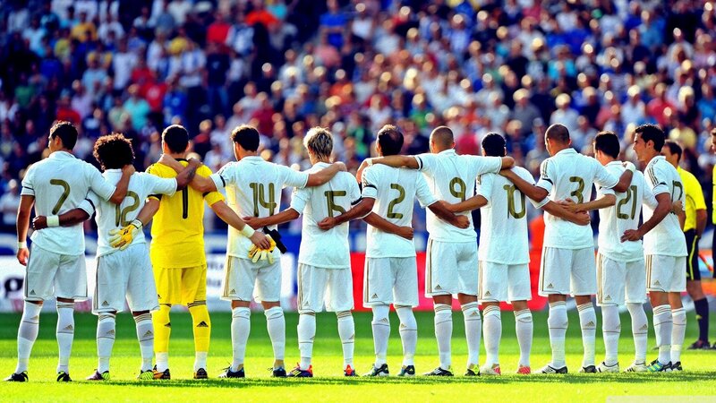 Soccer Players in Huddle