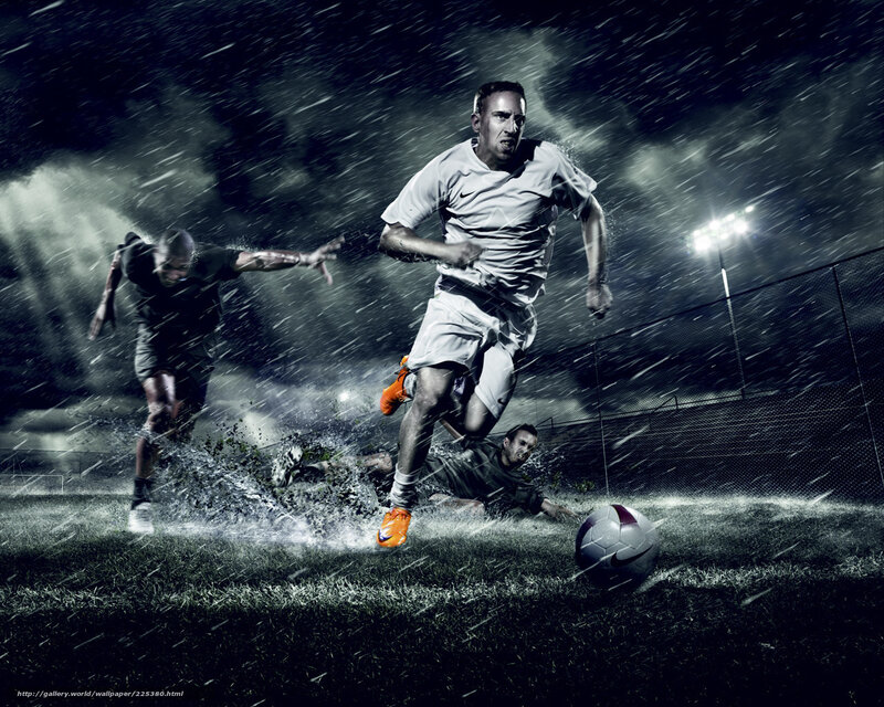 Soccer players in rain