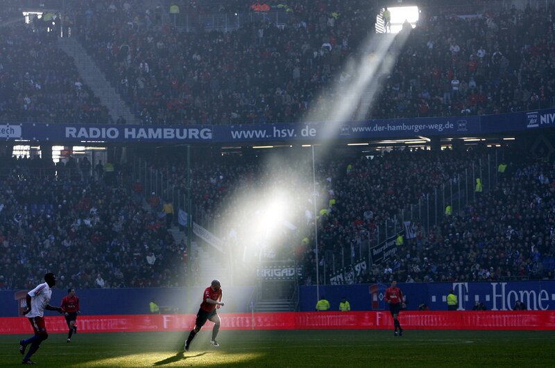 Soccer players on field at stadium
