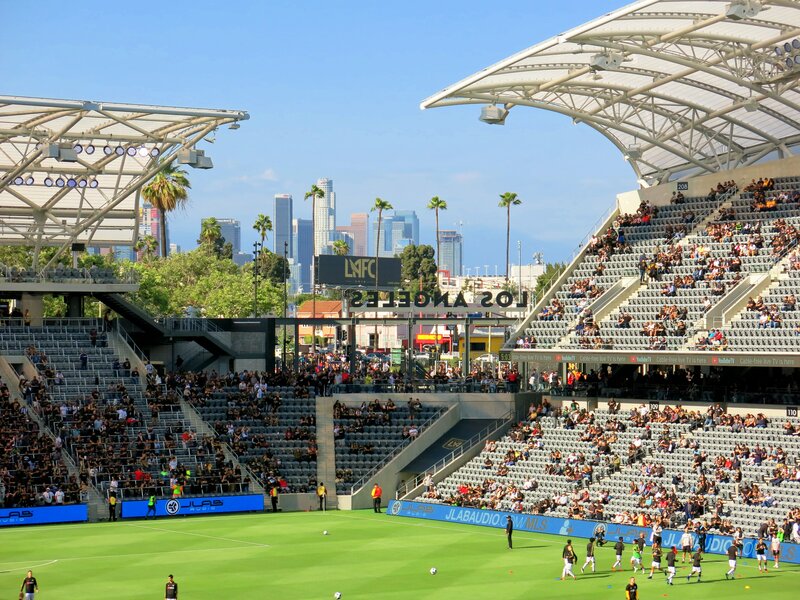 Soccer Players on Field — Green, Lively