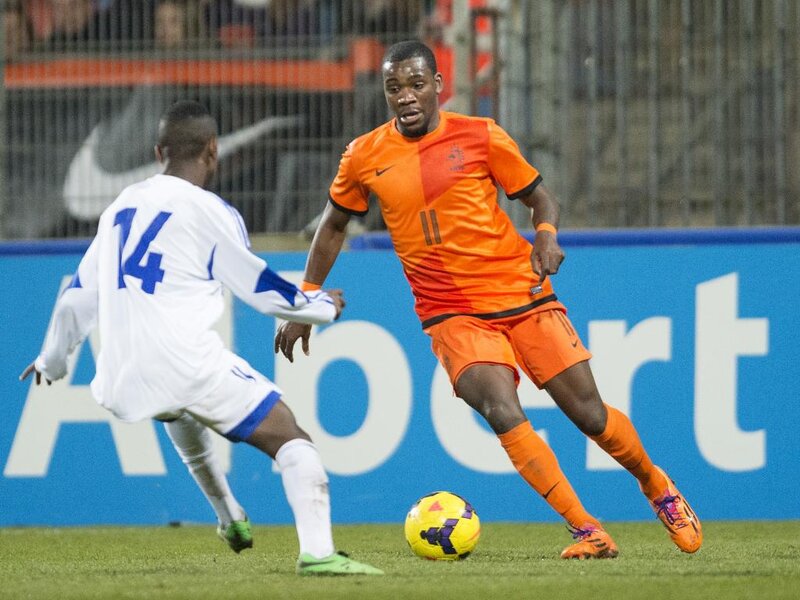 Soccer Players on Field — Orange