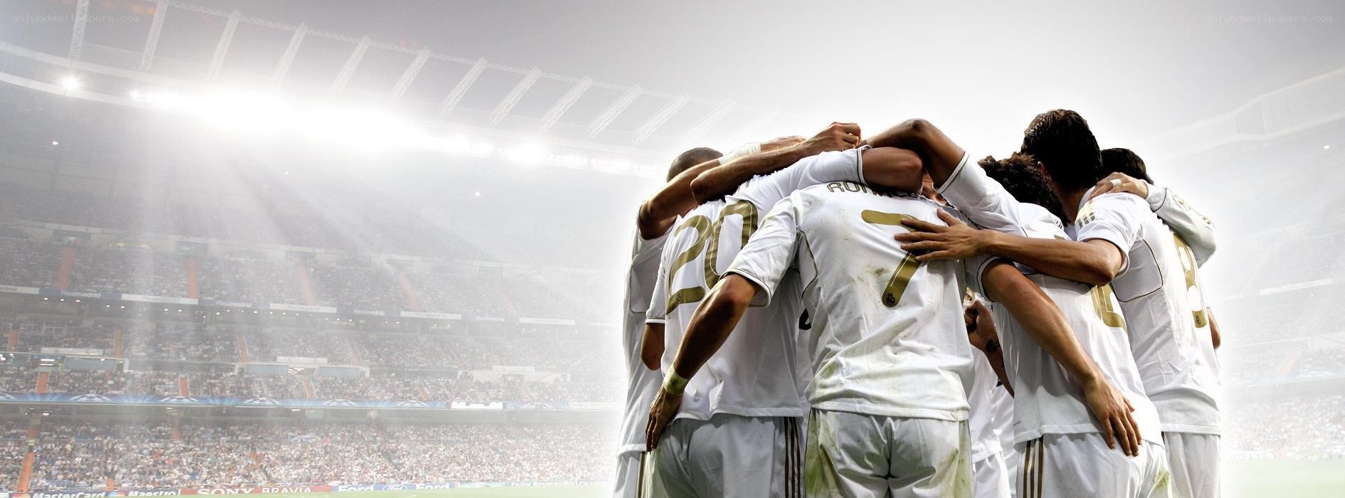 soccer team huddle in stadium