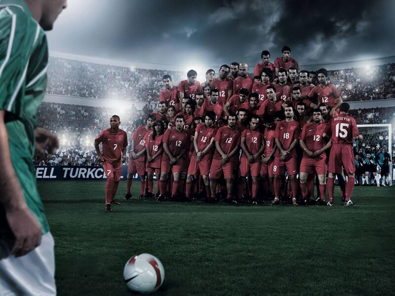 Soccer Team on Field — Red, Dramatic