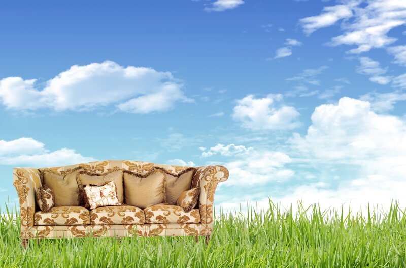 Sofa in a grassy field