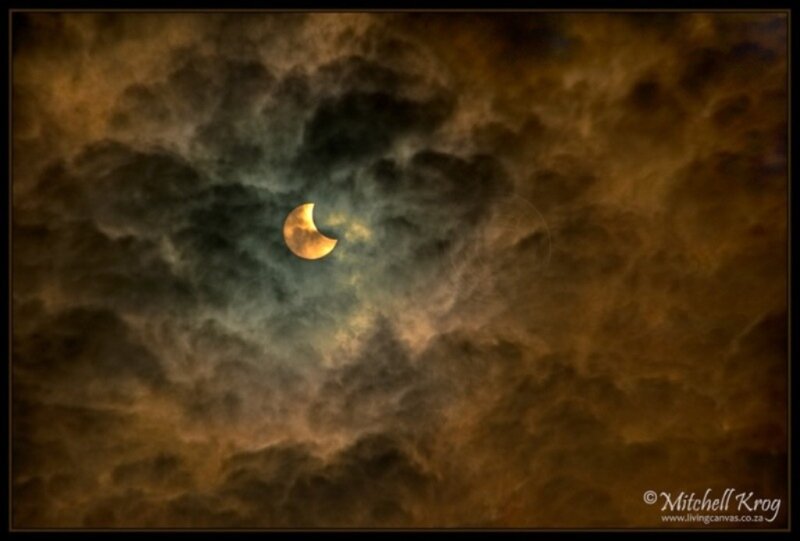 Solar Eclipse in Clouds — Brown