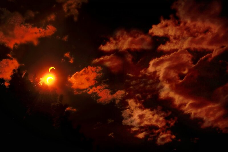 Solar Eclipse in Sky — Red