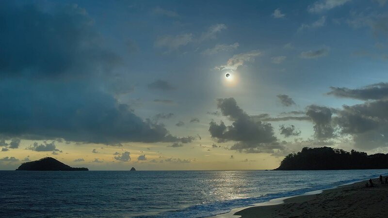 Solar Eclipse over Ocean — Blue, Dramatic