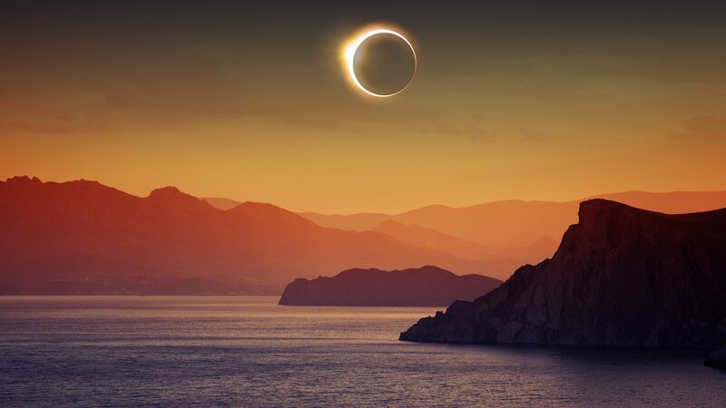 Solar Eclipse over Sea — Orange, Dramatic, Sunset