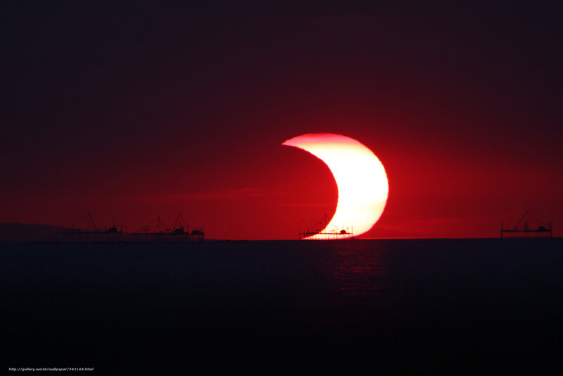 Solar Eclipse over Sea — Red, Dramatic