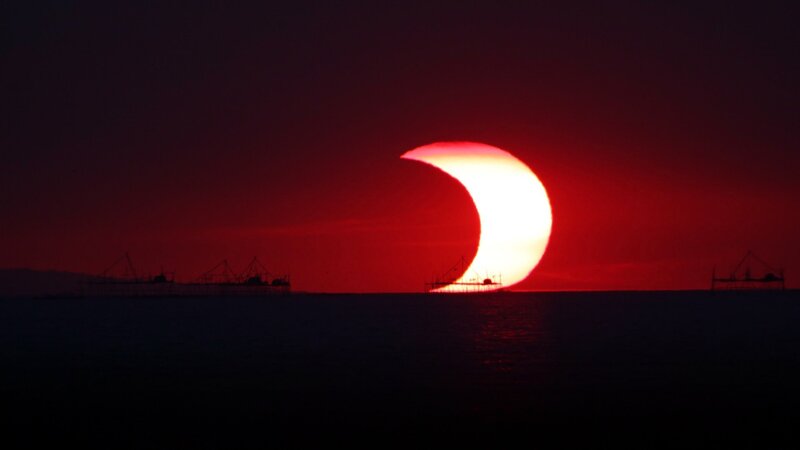 Solar eclipse over the sea
