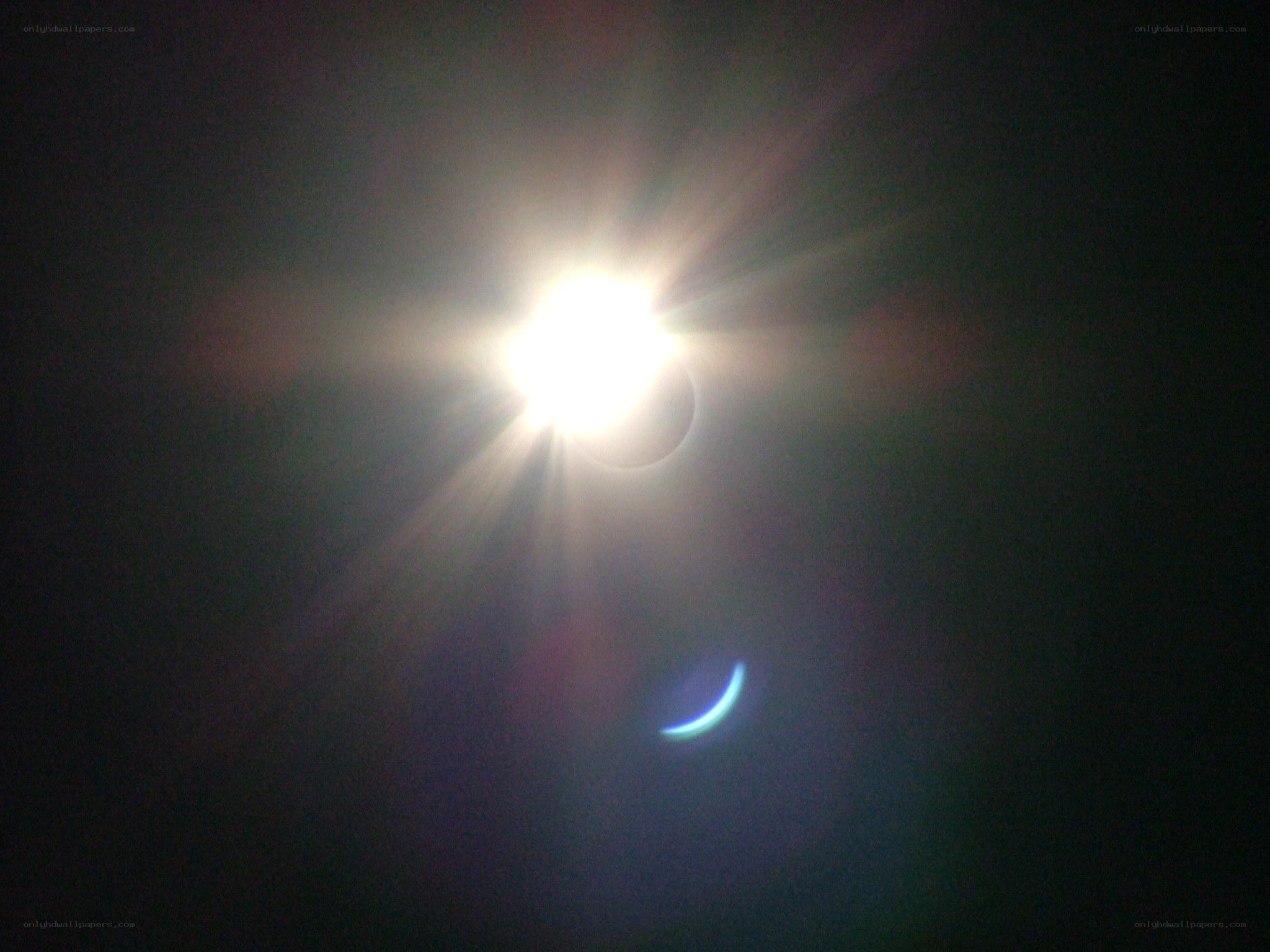 Solar eclipse with lens flare