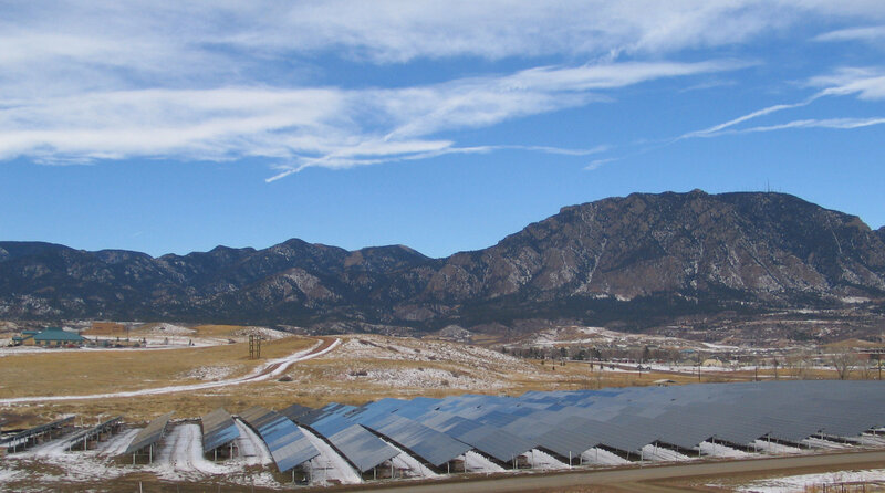 Solar panels in mountain valley