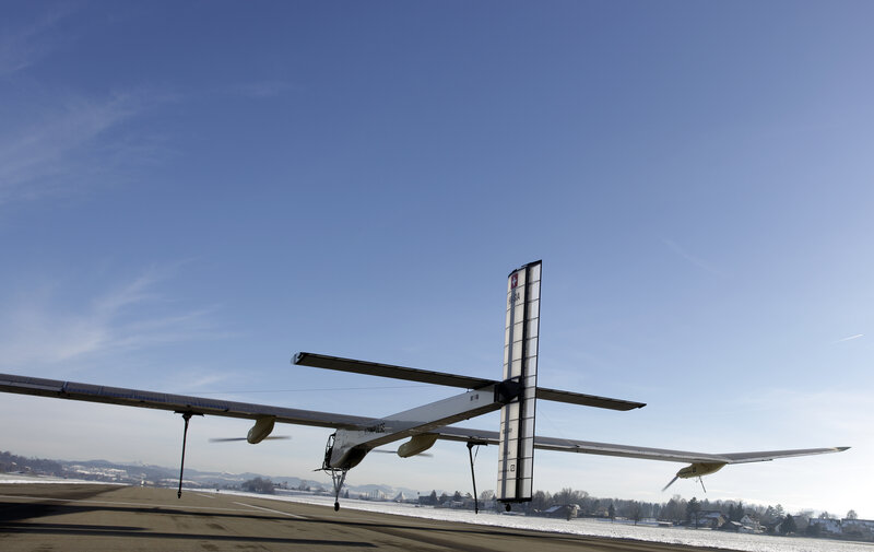 Solar-powered airplane on runway