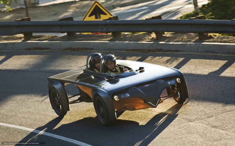 Solar-powered car on road