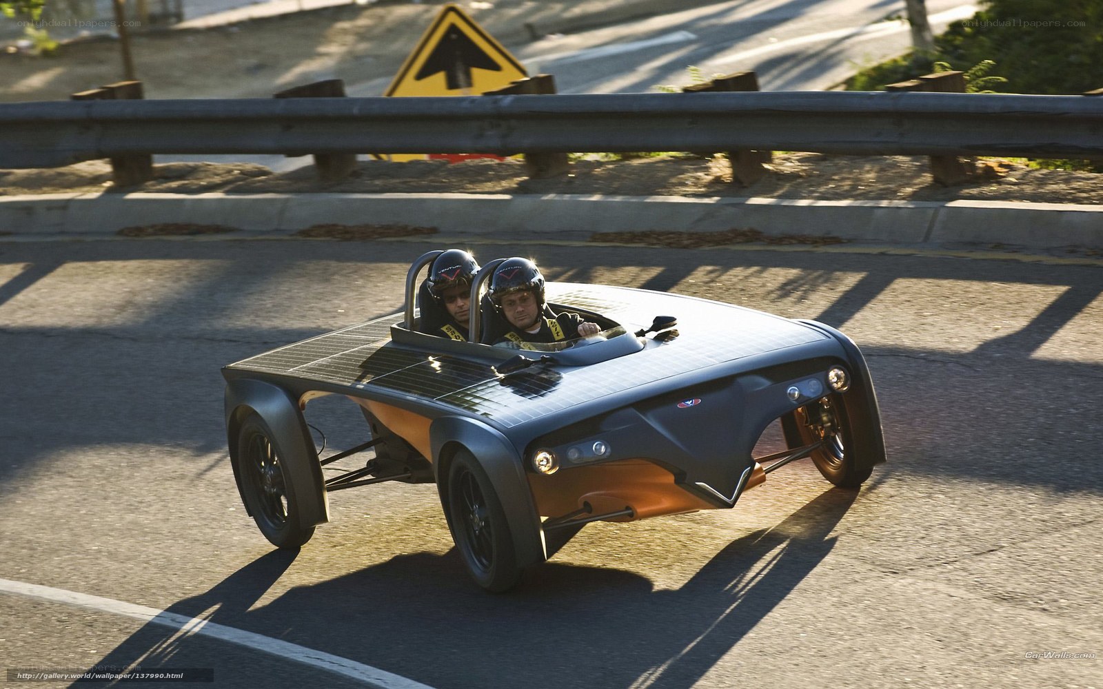 Solar-powered car on road