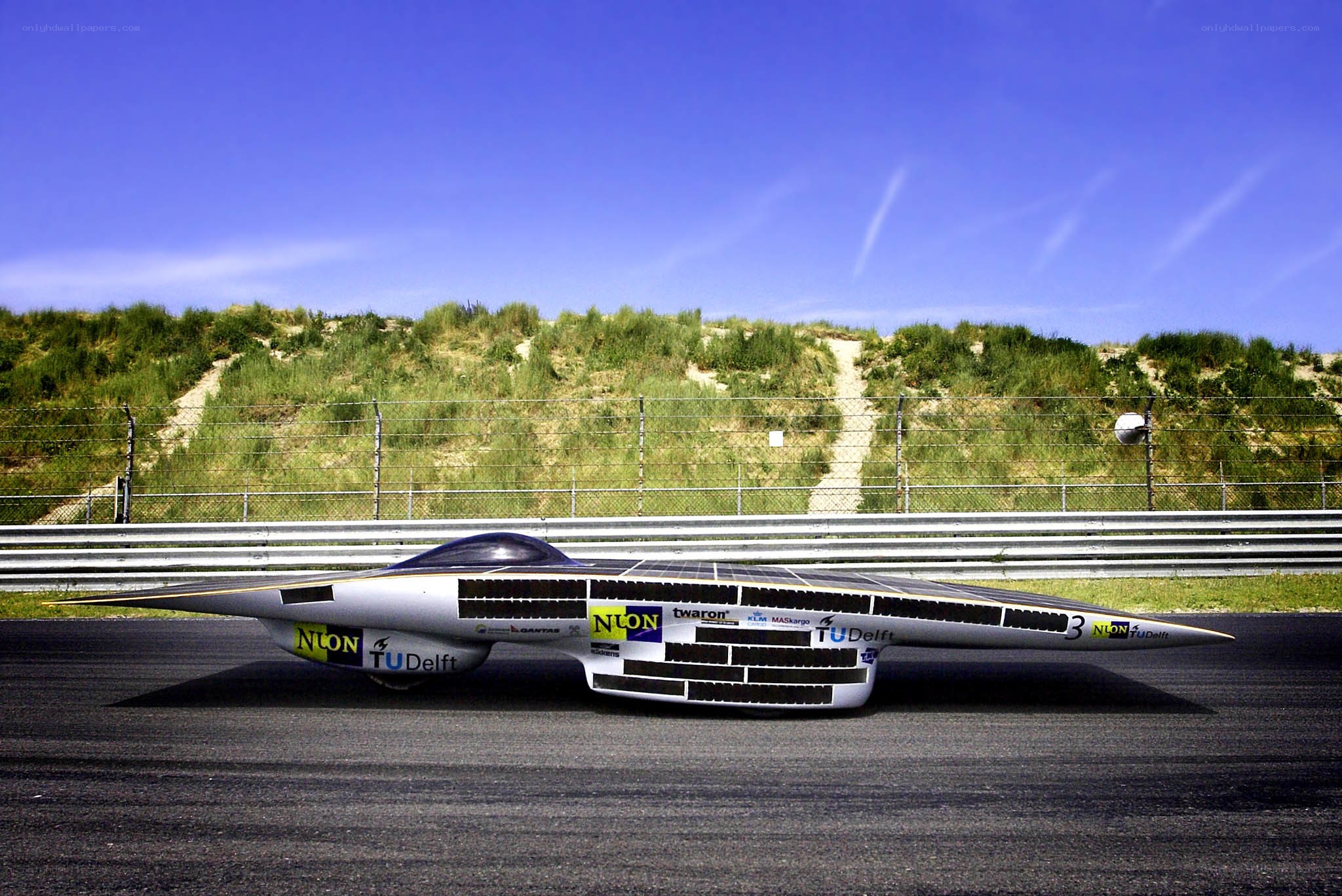 Solar-powered race car on track