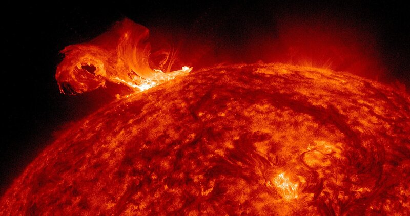 Solar Prominence Eruption — Red
